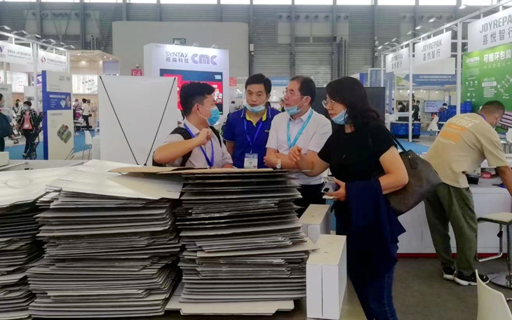 新印自動片穿提手機在上海電子商務(wù)包裝展受關(guān)注